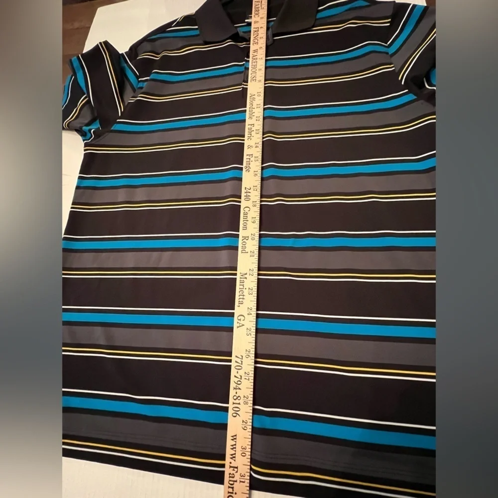 NIKE GOLF DRI-FIT SIZE LARGE MEN’S GOLF SHIRT. MULTI COLORED